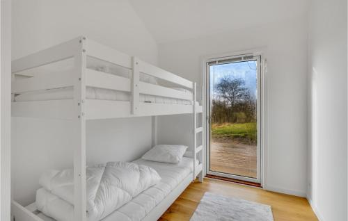 Amazing Home In Vordingborg With Kitchen emeletes ágyai egy szobában