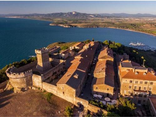 an aerial view of a castle next to the water at Il Balcone sull'Elba in Piombino