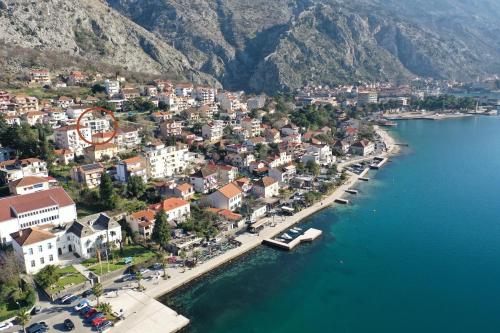an aerial view of a town next to a body of water at Solaris Lux Apartments in Kotor