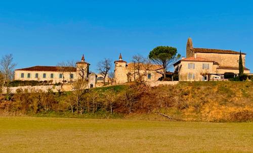 an old house on top of a hill at DOMAINE DE LEJOS - Portes d'Albi in Lamillarié