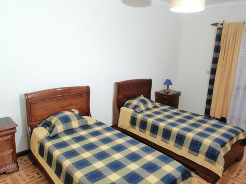 Postel nebo postele na pokoji v ubytování Casa Golfinho (Sul) - Costa Nova