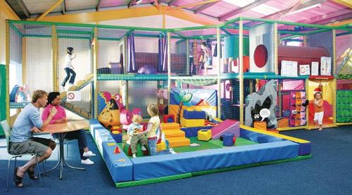 a group of people playing in a play room at Bella View - Newquay - White Acres in Newquay