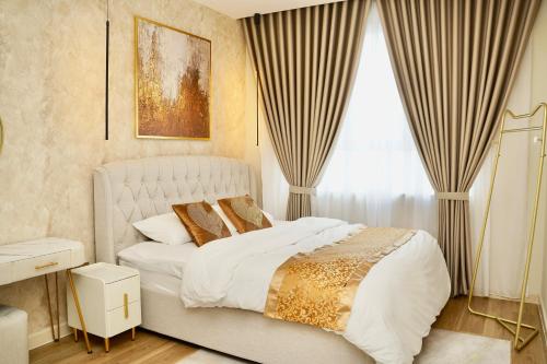 Posteľ alebo postele v izbe v ubytovaní Casa Callisto Homestay - New Seaview with pool 3BR Apartment Ladang Tanjung