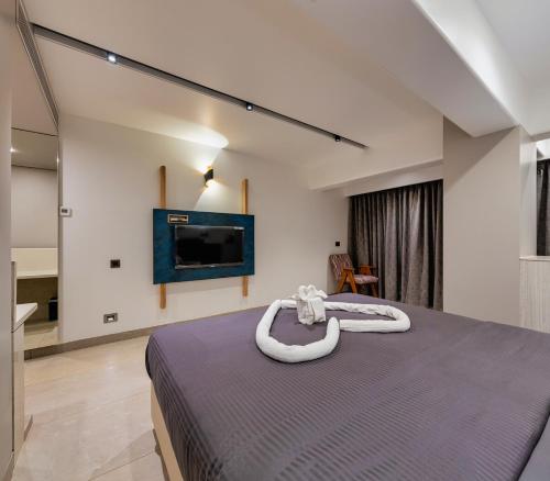 Katil atau katil-katil dalam bilik di Hotel Landmark By Pai
