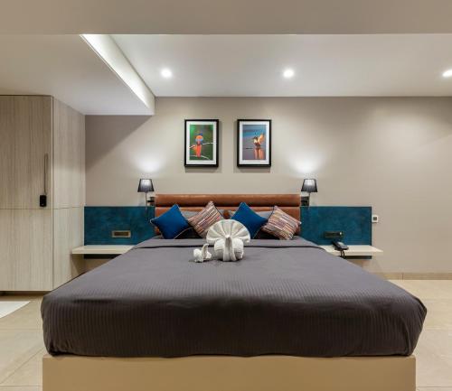 Katil atau katil-katil dalam bilik di Hotel Landmark By Pai