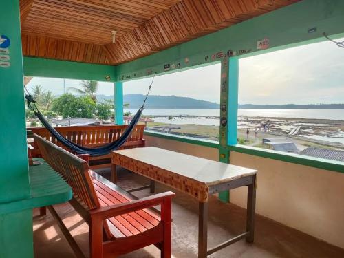 Photo de la galerie de l'établissement Marlynto Nias Losmen, à Lagudri