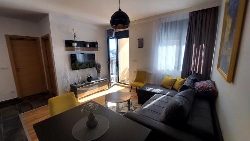 TV a/nebo společenská místnost v ubytování Apartman Kolar