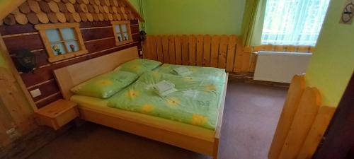 Кровать или кровати в номере ASPEN