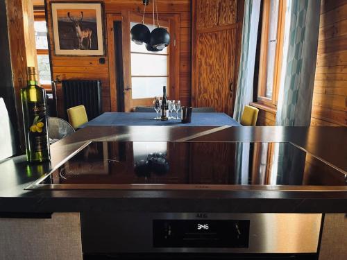 a kitchen with a stove and a counter top at Moon House in Przesieka