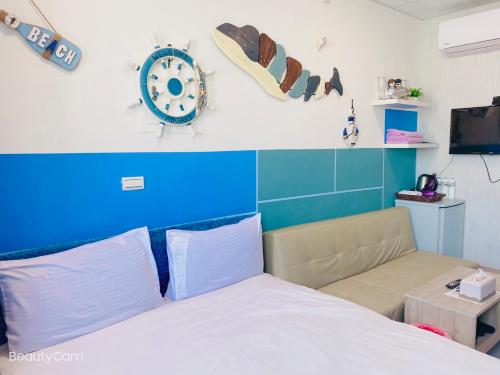 Cama o camas de una habitación en Aliyah阿利亞