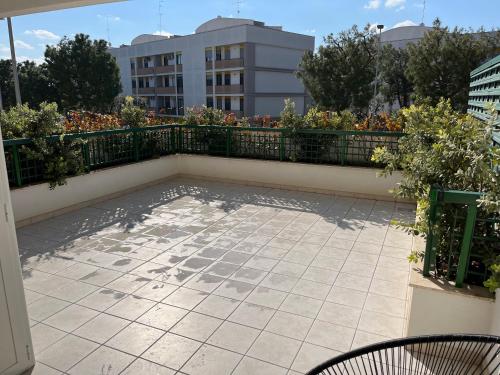 En balkon eller terrasse på PARCO VERDE APARTMENT