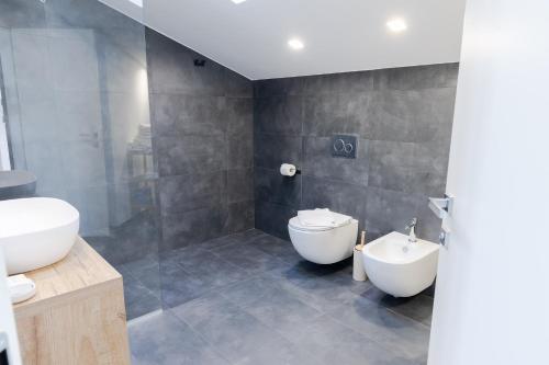 Ένα μπάνιο στο Villa la Matta Apartments and Luxury suites