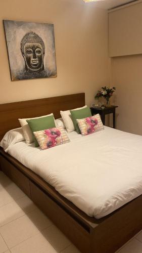 Кровать или кровати в номере Tagara