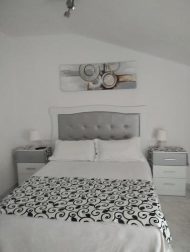 Ένα ή περισσότερα κρεβάτια σε δωμάτιο στο Casa Hostal Olga - Castilla y León