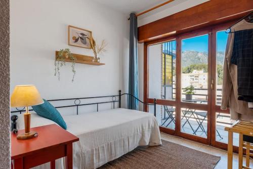 Central Apartment Steps from the Beach with Pool & Parking