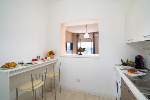 Kuchyň nebo kuchyňský kout v ubytování Loft Panorama di Naxos