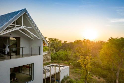a house with a view of the forest at Kruger Cliffs Lodge - Absolute privacy guaranteed in Hoedspruit