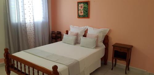 Postel nebo postele na pokoji v ubytování Paisible maison à Vieux-Habitants