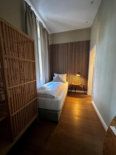 Katil atau katil-katil dalam bilik di Hotel Zur Alten Brücke