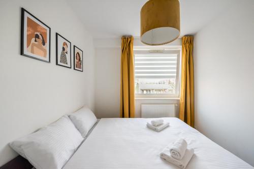 Posteľ alebo postele v izbe v ubytovaní MarOks Żółwia Apartment