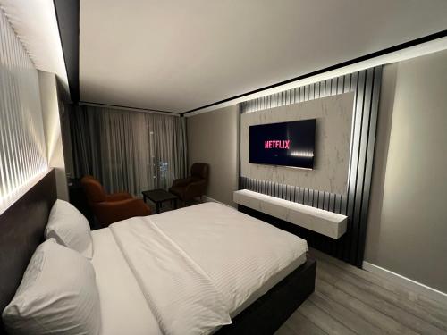 Cama o camas de una habitación en BALA HOTEL