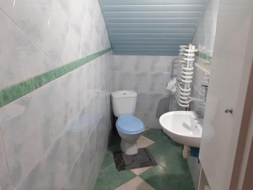 Kúpeľňa v ubytovaní Pokoje Giżycko