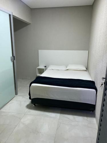Säng eller sängar i ett rum på Morada do Lago