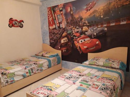 En eller flere senger på et rom på Appartement Adrar