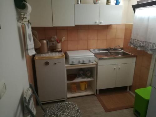 Η κουζίνα ή μικρή κουζίνα στο The Loft - CIR 19084032C204986