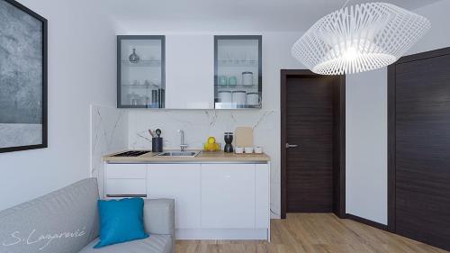 Η κουζίνα ή μικρή κουζίνα στο Glečer Apartman 6