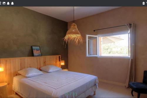 Posteľ alebo postele v izbe v ubytovaní Maison CALM2