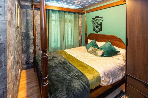 a bedroom with a bed on a boat at Hogwarts Hideaway Themed Property in Garston