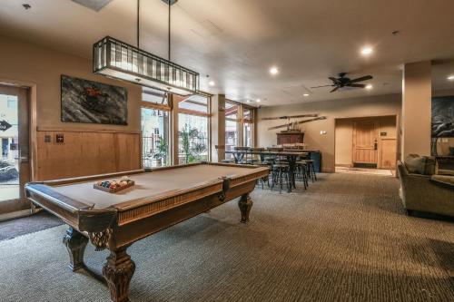 a large room with a pool table in it at Silver Mill 8154 in Keystone