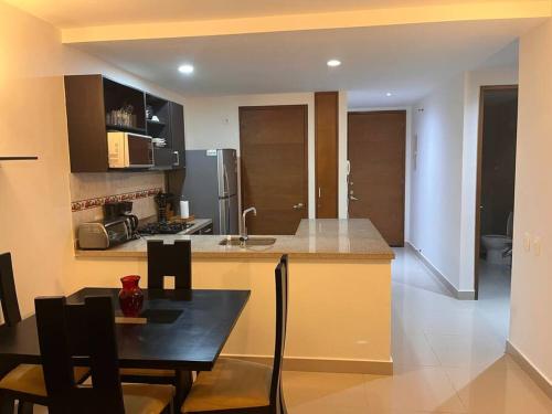 Kuchyň nebo kuchyňský kout v ubytování Apartamento con vista al mar