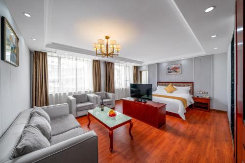 Postel nebo postele na pokoji v ubytování Guangzhou Shi Liu Hotel