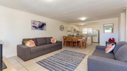 A seating area at Comfy Ground Floor Unit opposite waterfront! Welsby Pde, Bongaree