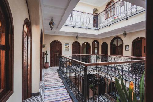 an empty hallway with a staircase in a building at Auberge RIAD DLIM Tamraght in Tamraght Ouzdar