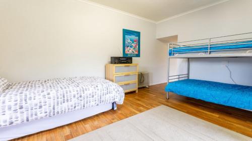 Una cama o camas en una habitación de Enjoy & Soak Up the Tranquility Of Woorim
