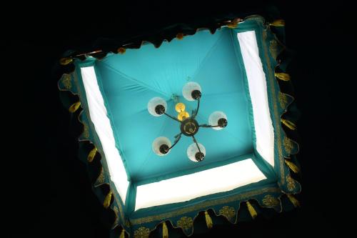 a cake with a clock on top of it at Ananda Resort in Pushkar