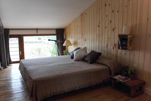 Säng eller sängar i ett rum på El Palomar de Peñarrubia
