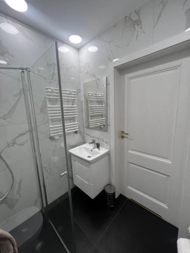 Ванна кімната в Adzikowy Dworek