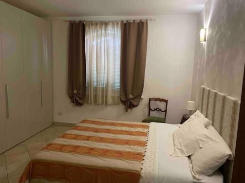 Cama o camas de una habitación en Il giglio perlato