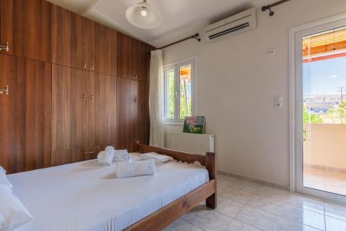 Ένα ή περισσότερα κρεβάτια σε δωμάτιο στο Elena's Apartment