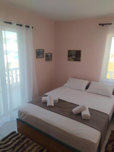 Postel nebo postele na pokoji v ubytování Anestis Apartment