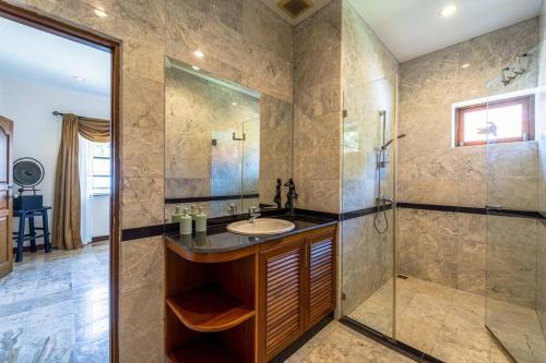 a bathroom with a sink and a shower at Cozy 3 Bedroom Pool Villa Close to Town - CV3L in Hua Hin