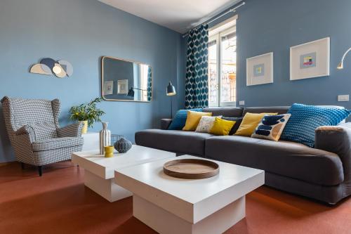 a living room with a couch and a table at Navona 49 Luxury Suites&Apartment in Rome