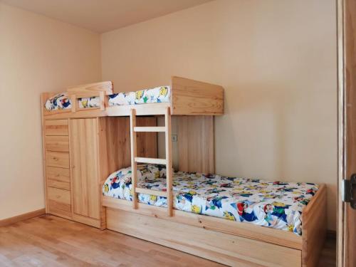 Postel nebo postele na pokoji v ubytování Apartamento muy espacioso y luminoso Erta 5
