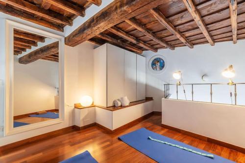 A bed or beds in a room at HospitalityRome Piazza di Spagna View