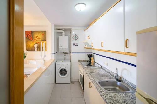 Virtuvė arba virtuvėlė apgyvendinimo įstaigoje Alborada Golf 3BD