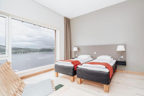 Ένα ή περισσότερα κρεβάτια σε δωμάτιο στο Wood Hotel by Frich's